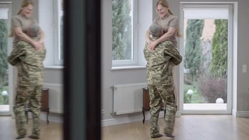 Soldier Returns Home to Embrace Wife