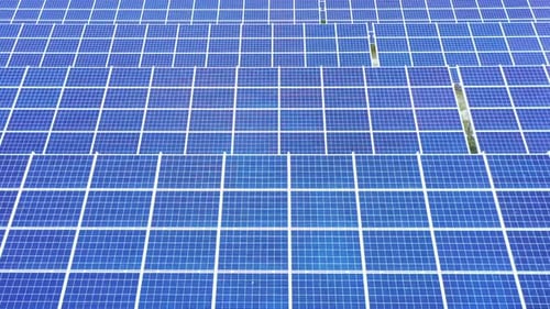 Closeup of surface of blue photovoltaic solar panels for producing clean ecological electricity. Pro