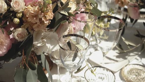 Medium Shot Festive Bouquet Plates and Glasses on the Table