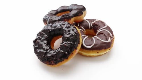 Chocolate donuts on a white background