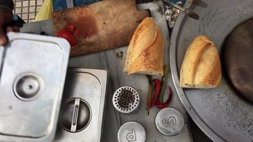 Preparing Fresh Sandwich at a Street Food Stand