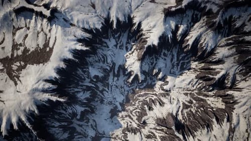 Aerial View of Snow Mountain Range Landscape