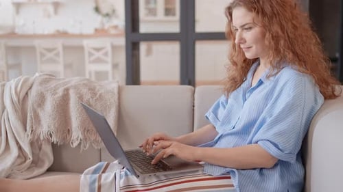 Lady Works Remote or Chatting Online on Computer