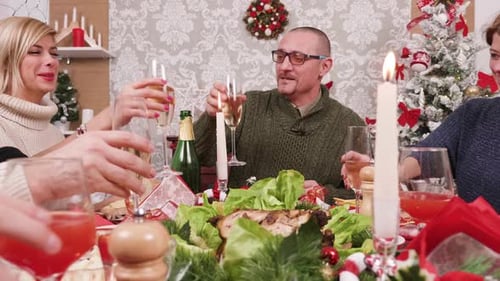 People Celebrate Christmas with Champagne Toast