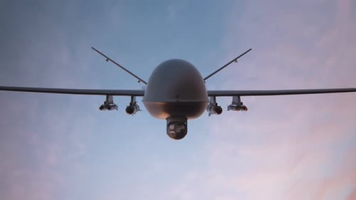 Advanced Military Surveillance Drone Flying Over Mountainous Coastal Landscape