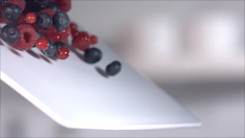 Mixed Berries Falling in Slow Motion