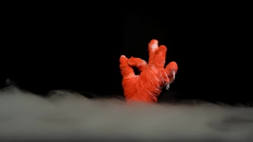 Bandaged Red Hand Emerges from the Fog
