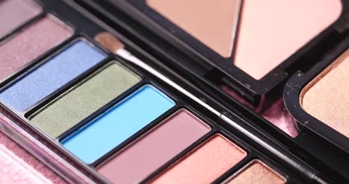 Colorful Eyeshadow Palette and Brush Close Up