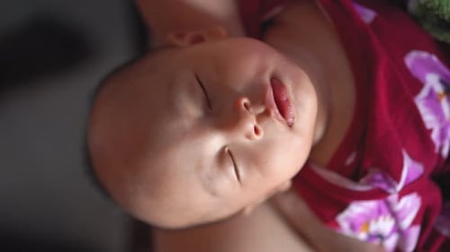 Baby Sleeping Peacefully in a Close Up Shot
