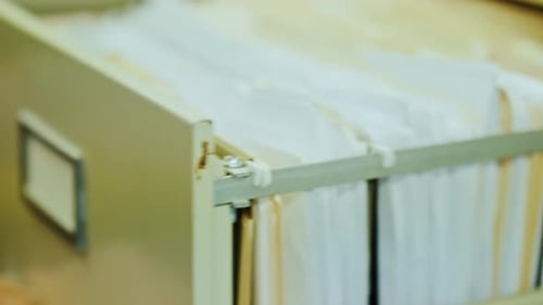 Female Hands Open a Retractable Drawer in Retro Style