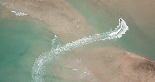 Beautiful beach with sea transparent clean water on both sides. Island concept travel destination.