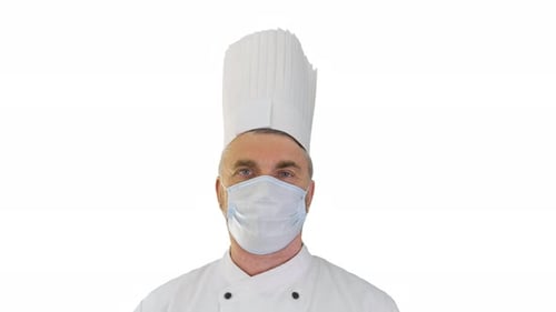 Chef Wearing Surgical Mask and Chef's Hat