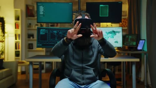 Man Wearing VR Headset Interacting With Virtual World