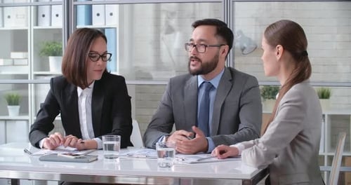 Collaborative Business Meeting in Modern Office