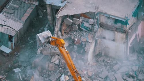 Demolition of Building by Excavator from Aerial View
