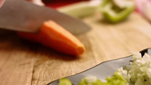 Carrot Being Chopped on Cutting Board, Close Up