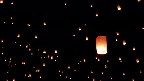 Sky Lanterns Fly Into The Night Sky