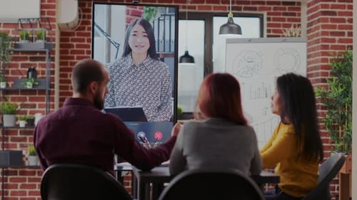 Business Team Having a Video Conference in Office