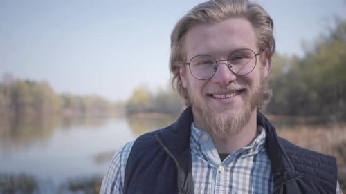 Portrait Bearded Man Looking at Camera Outdoors