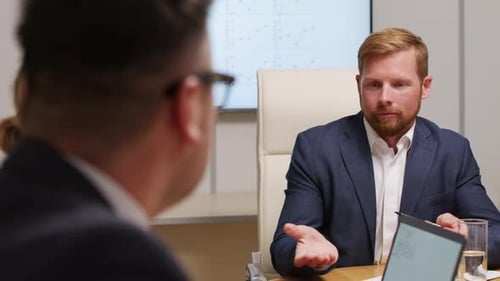 Professional Business Discussion in a Modern Office