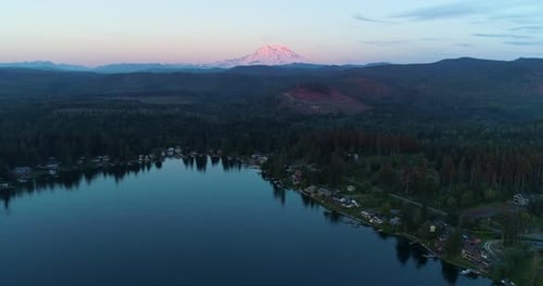 Flying Away From Mount Rainier At Sunset Above Lake