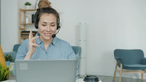 Slow Motion of Female Telephonists Making Calls and Talking To Customers in Technical Support