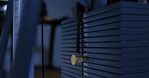 Weight Machine Adjustment in Fitness Center