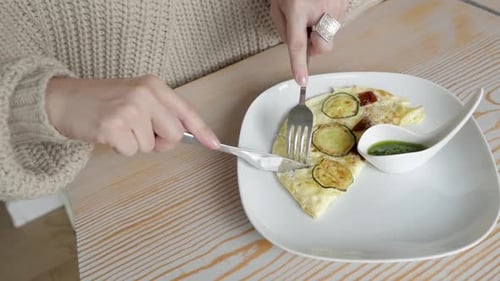 Close Up Lifestyle Image of Woman Starting Eat Her French Tasty Breakfast Contains Scramble Eggs