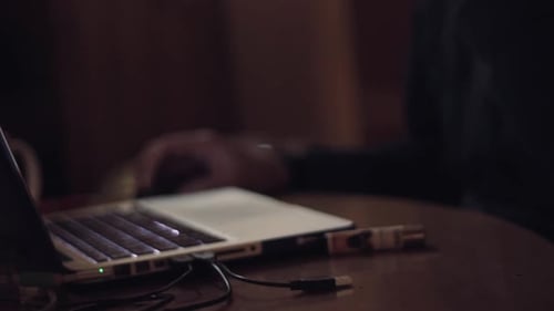 guy working at night on his computer