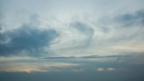 Dramatic Clouds Moving Across a Time-Lapse Evening Sky