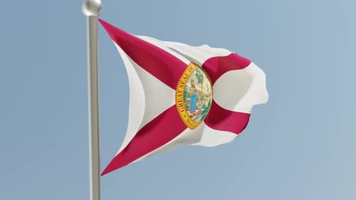 Florida State Flag Waving Realistically on Pole Against Blue Sky