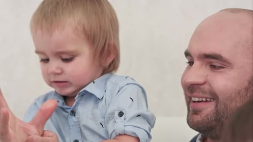 Loving Father Bonding with Blond Haired Child