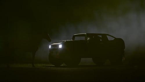 Horse and Terrain Vehicle on Foggy Background