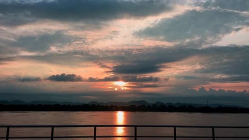 Fiery Sunset Over Still Water