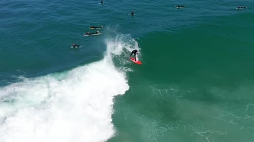 Surfer Riding a Wave in the Ocean