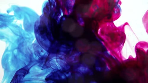 Blue and Pink Dye Mixing in Water