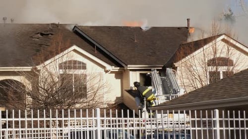 Firefighter Fights Condo Building Fire