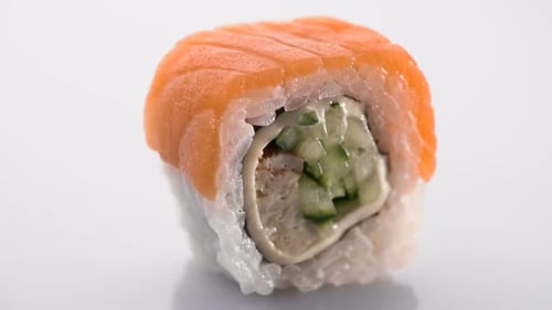 Delicious Sushi Roll Close Up on White Background