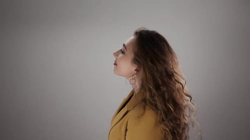 Woman Whips Hair and Poses