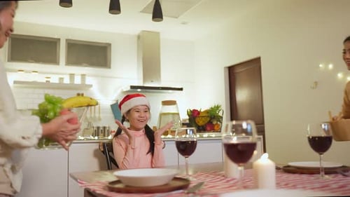 Happy Family Gathering for Christmas Dinner at Home