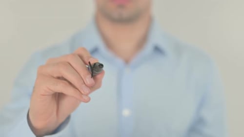 Man Writes You Can Change on Glass