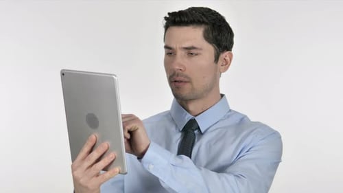 Young Adult Man Using Tablet Device
