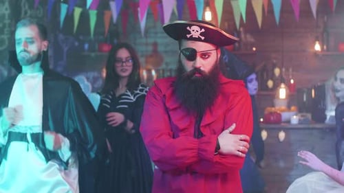 Halloween Party with People in Costume Dancing