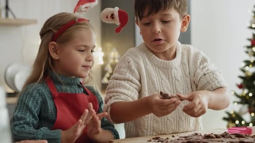 Children Baking Christmas Cookies at Home