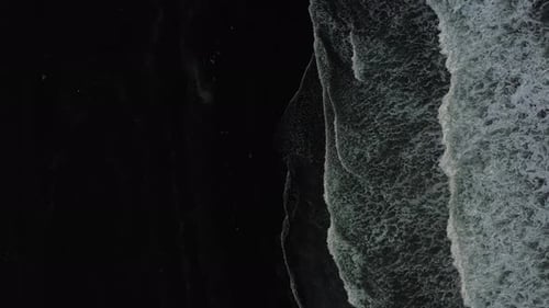 Ocean Waves on Black Sand Beach in Iceland