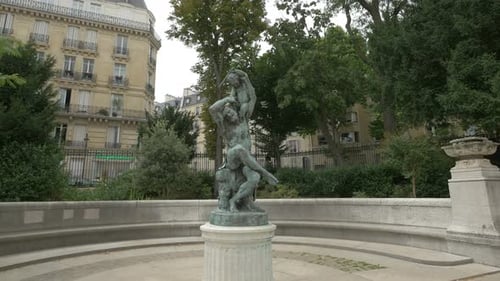 Statue of a man and a child