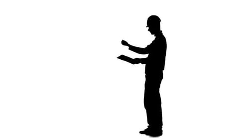 Foreman Looks at the Paper Plan of the Building and Screams at His Workers. Silhouette. White