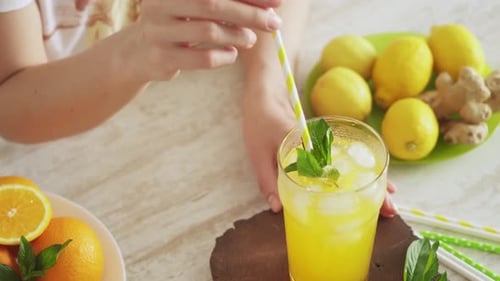Refreshing Drink Preparation with Citrus and Mint