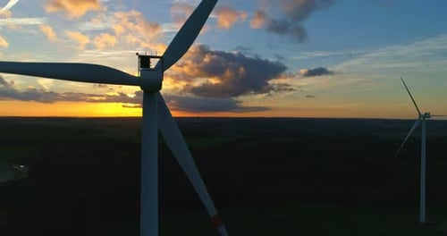 Wind Turbines Silhouetted at Sunset