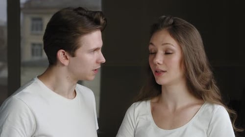Young Adults Talking, Arguing, Indoors